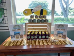 Sales display of Fore Real Honey jars.