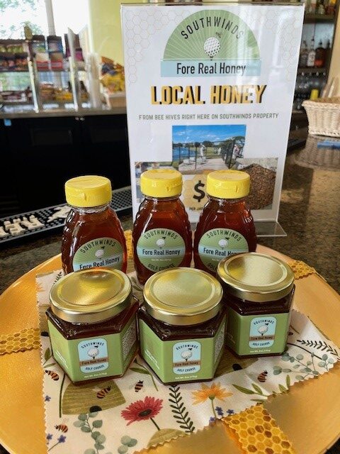 An arrangement of Fore Real Honey jars.