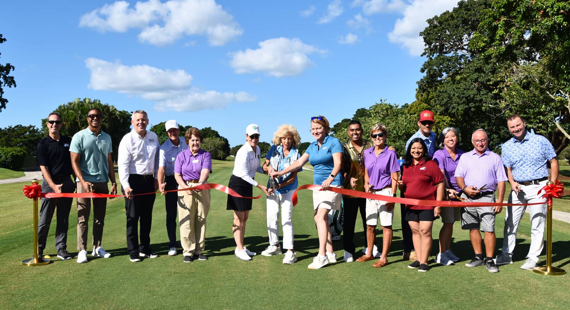 Ribbon cutting on the green.